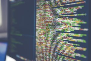 Programming code displayed on a dark screen
