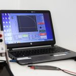 Solar panels and laboratory equipment under bright light